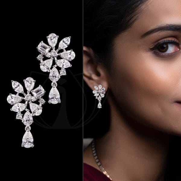 Breathtaking stunner diamond earrings with solitaire fancy shape diamonds.