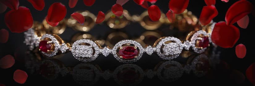 A stunning diamond and ruby bangle.