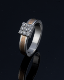 Diamond studded platinum and yellow gold ring for men from the Pache collection.