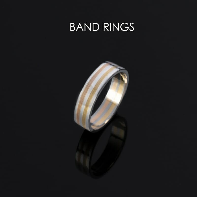 Stunning platinum and yellow gold band ring for men from the Pache collection.
