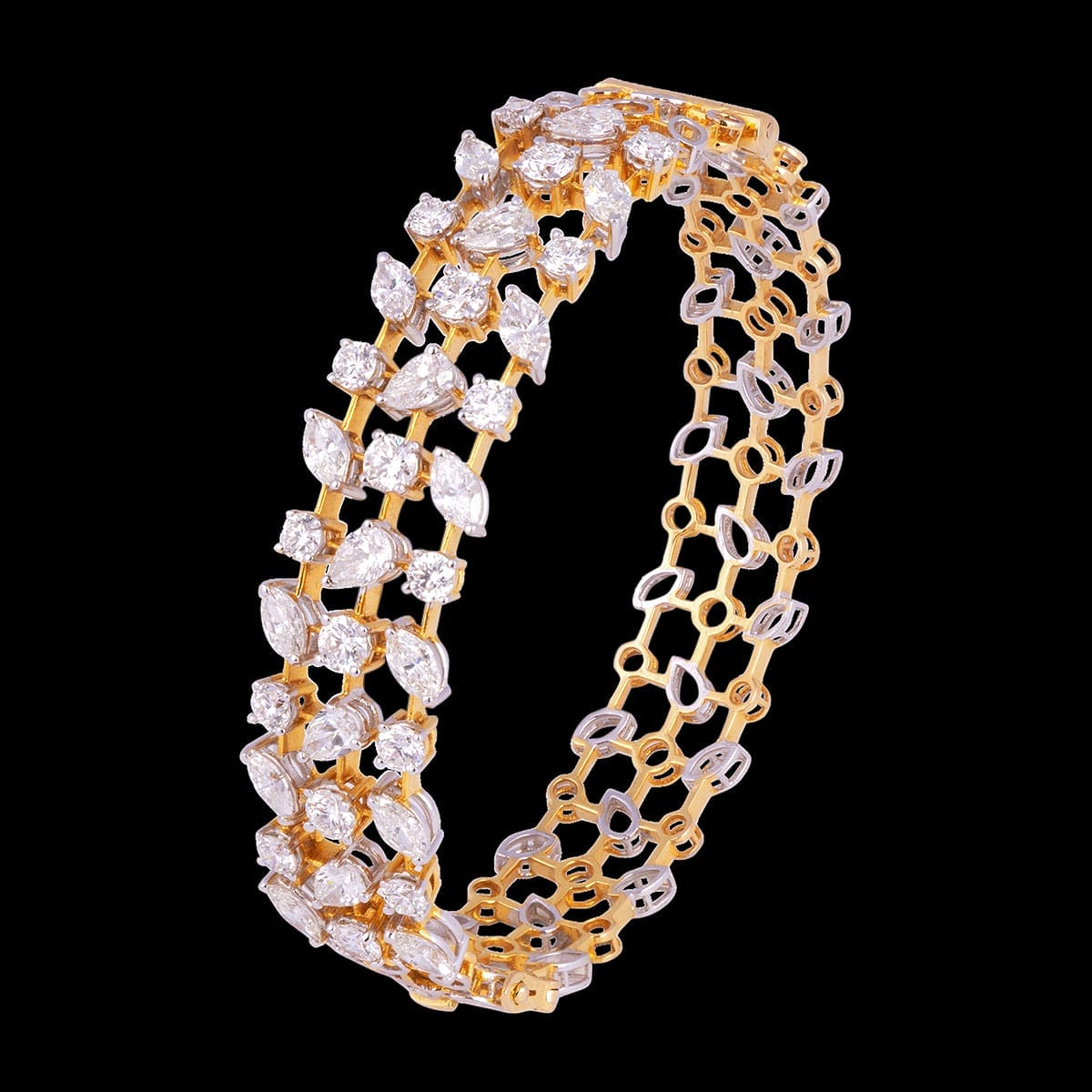 Synchronized stunner diamond bracelet with rows of multi-shape solitaire diamonds.