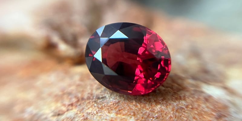 A Garnet gemstone, the official birthstone for January that signifies protection, friendship, trust, commitment, and love.