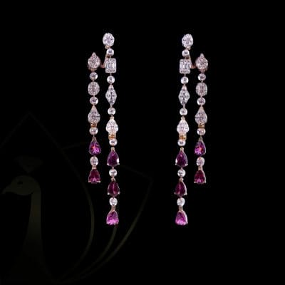 The sonata diamond chandelier earrings with garnet gemstones from Khwaahish.